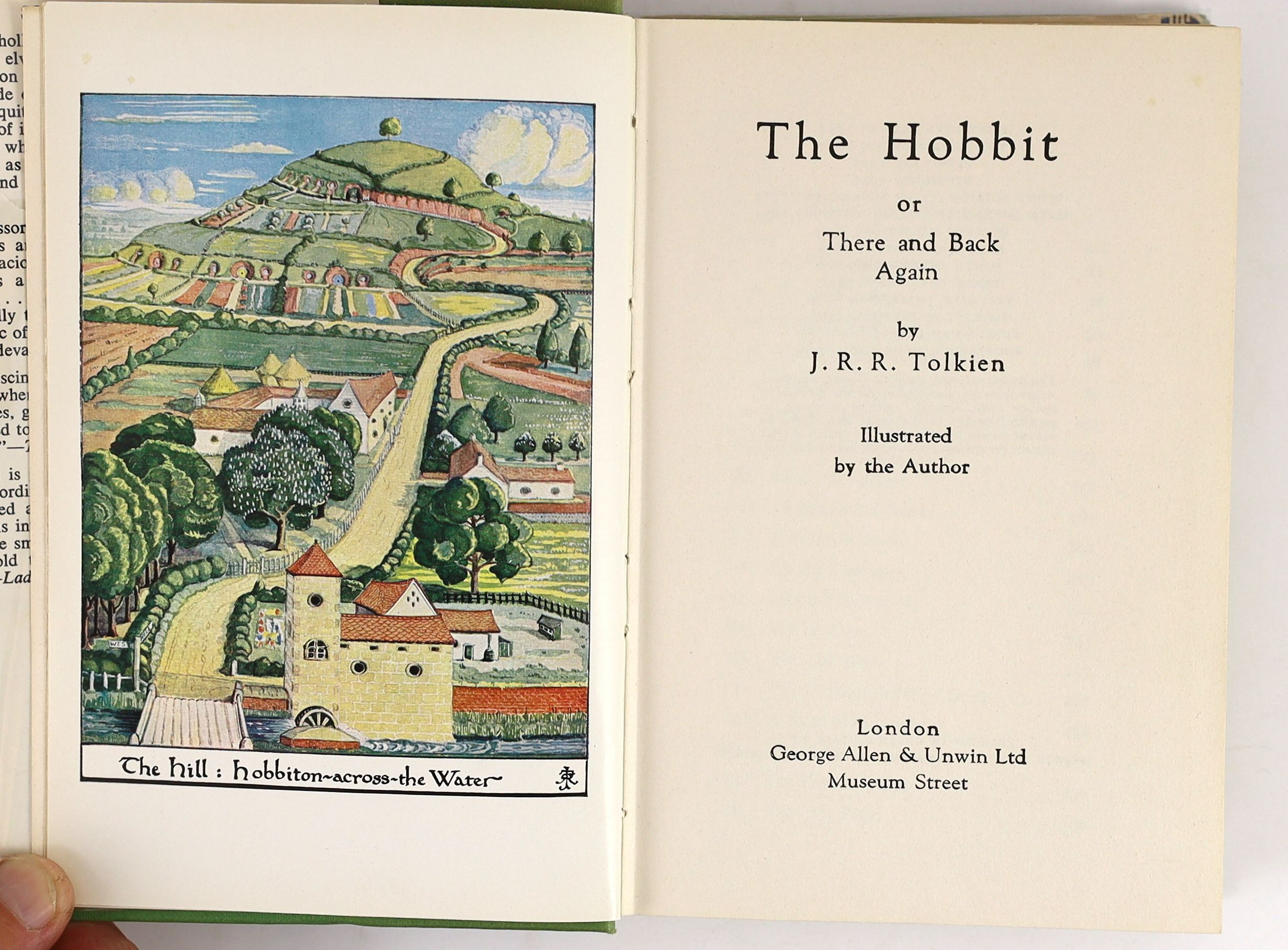 Tolkien, John Ronald Reuel - The Hobbit, 2nd edition, 14th impression, with colour frontispiece, map endpapers, original green cloth in clipped d/j, spine with minor tears and loss, ownership inscription in red ink to fr
